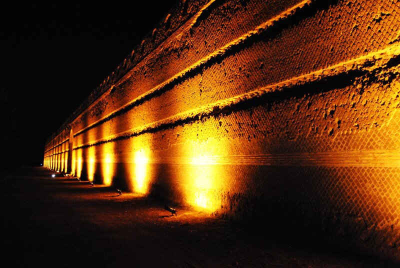 Illuminated brick wall at night