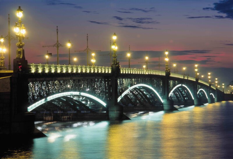 illuminated bridge at dusk