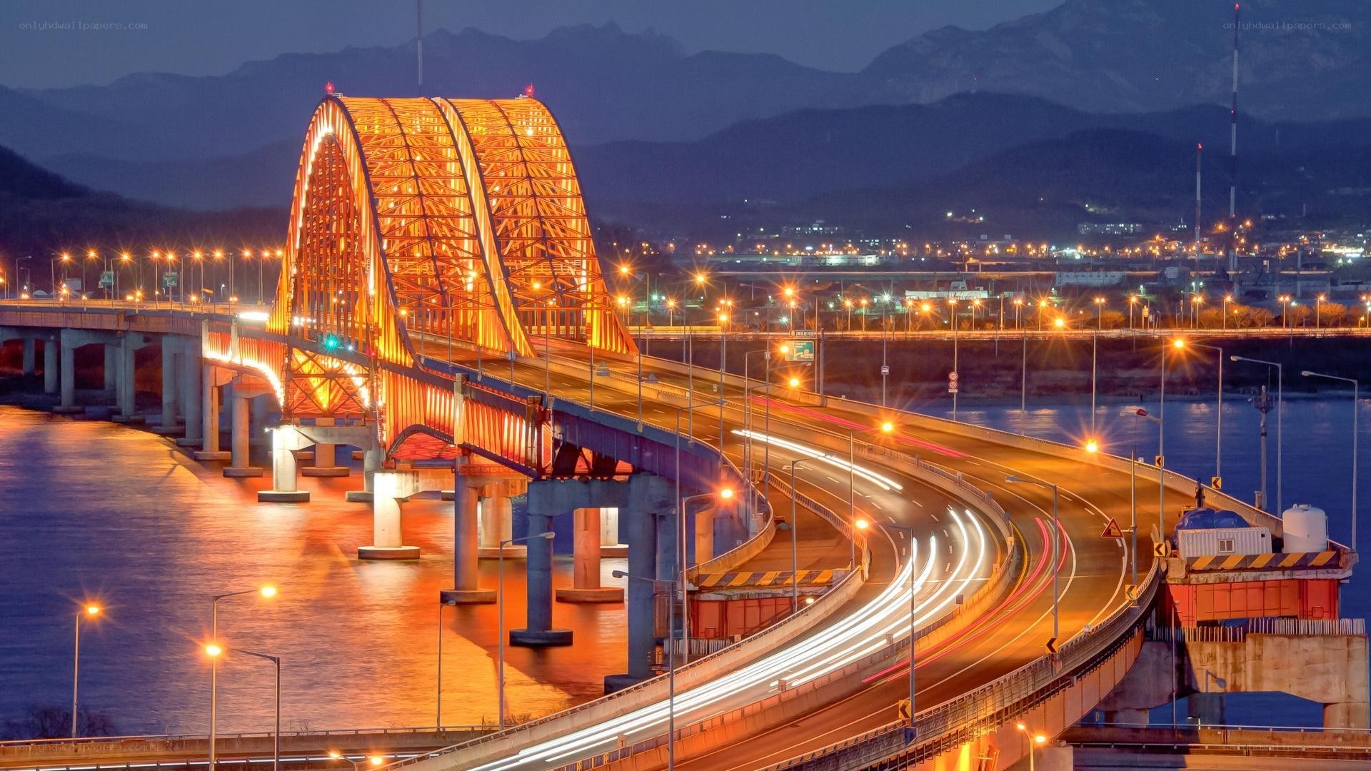 Illuminated bridge at dusk