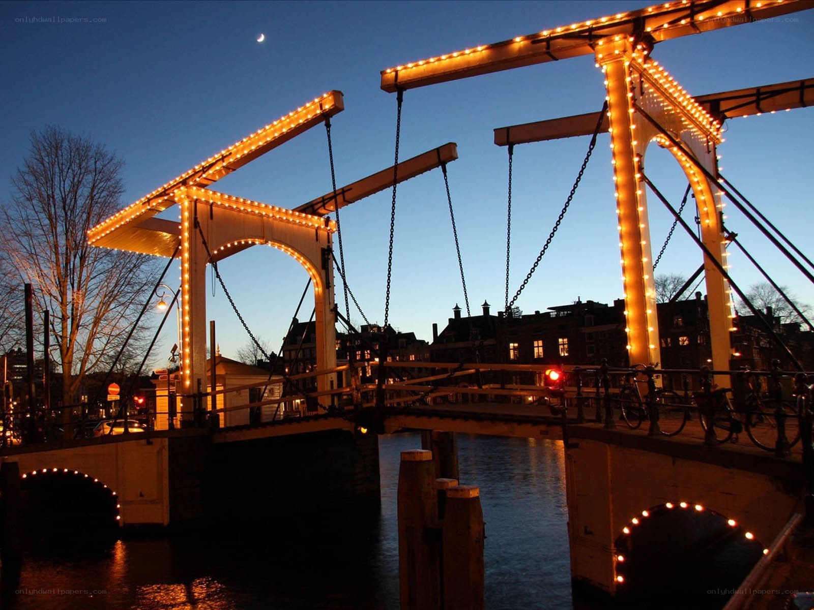 illuminated bridge at dusk