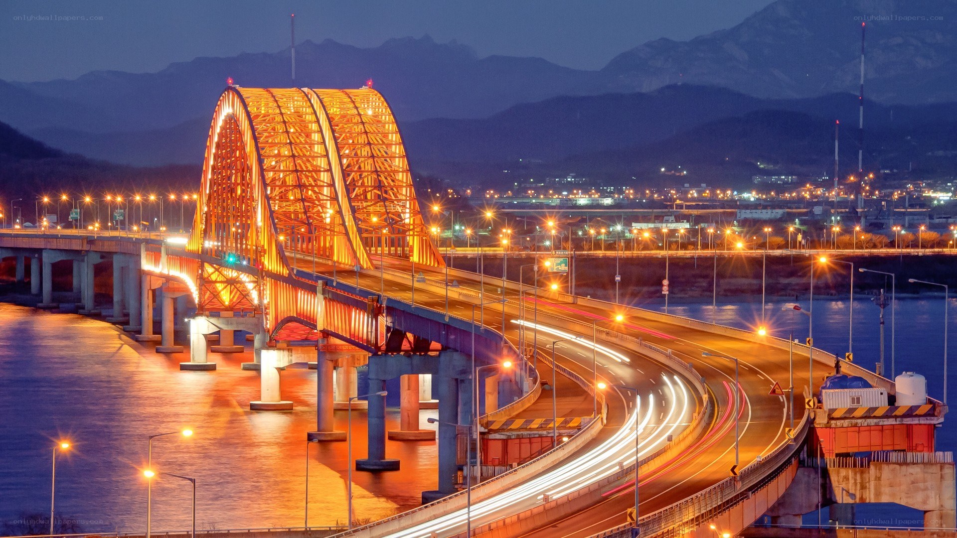 Illuminated bridge at dusk