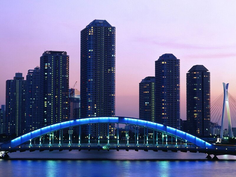 Illuminated Bridge at Dusk — Blue, Serene, Sunset