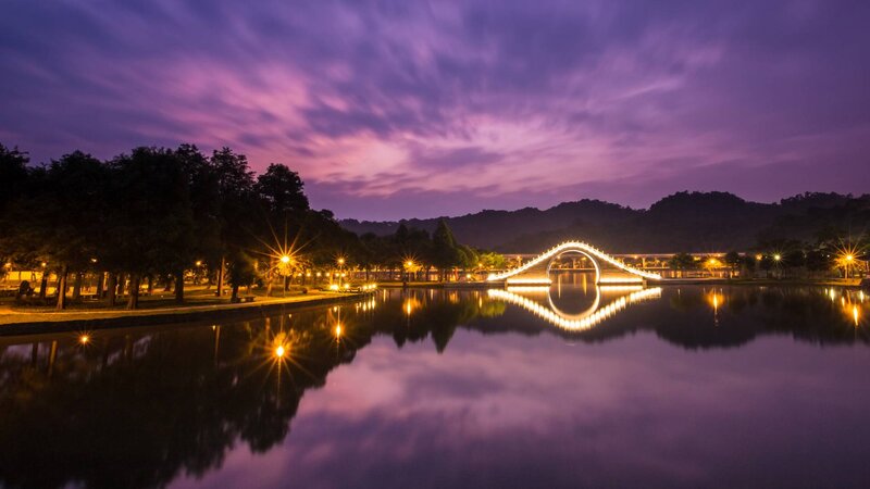 Illuminated Bridge at Dusk — Purple, Serene, Night