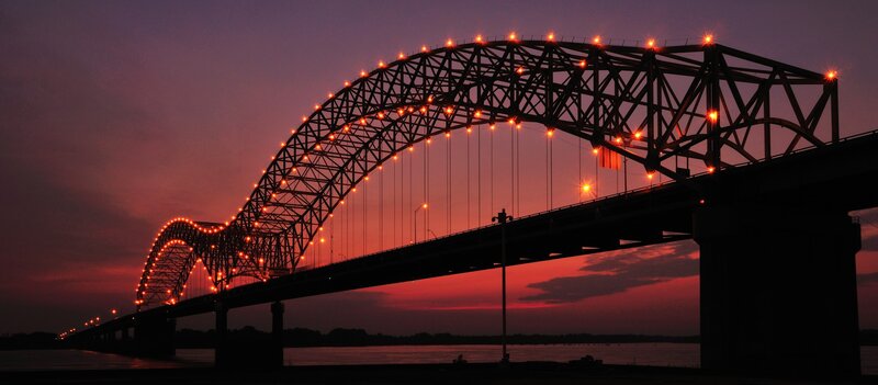 Illuminated Bridge at Dusk — Purple
