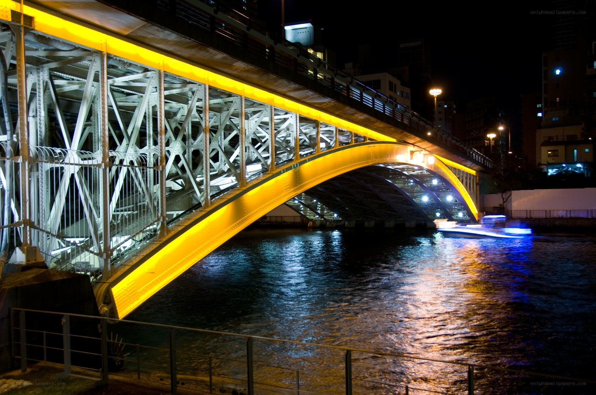 illuminated bridge at night