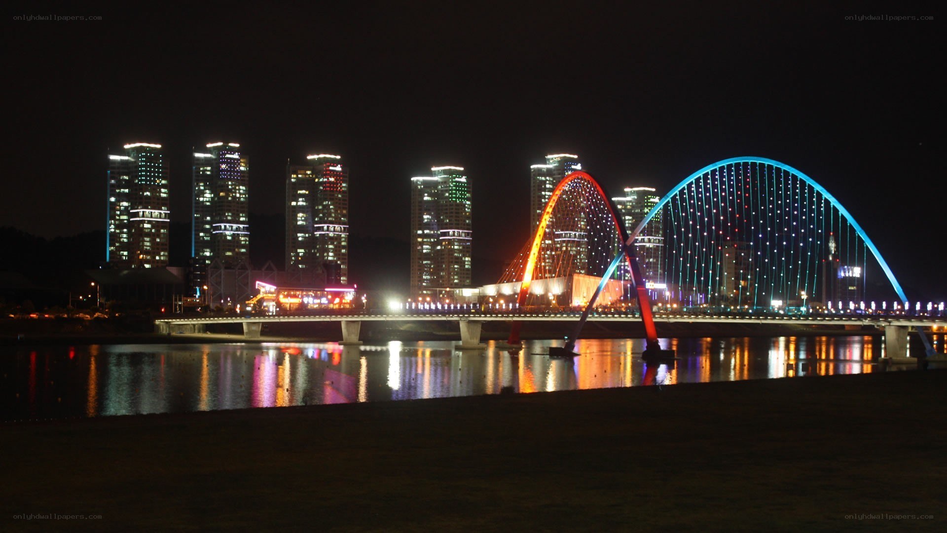 illuminated bridge at night
