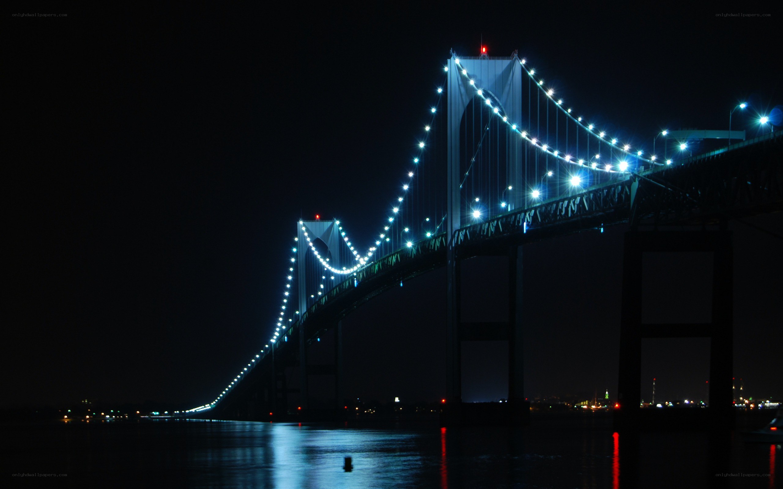 illuminated bridge at night