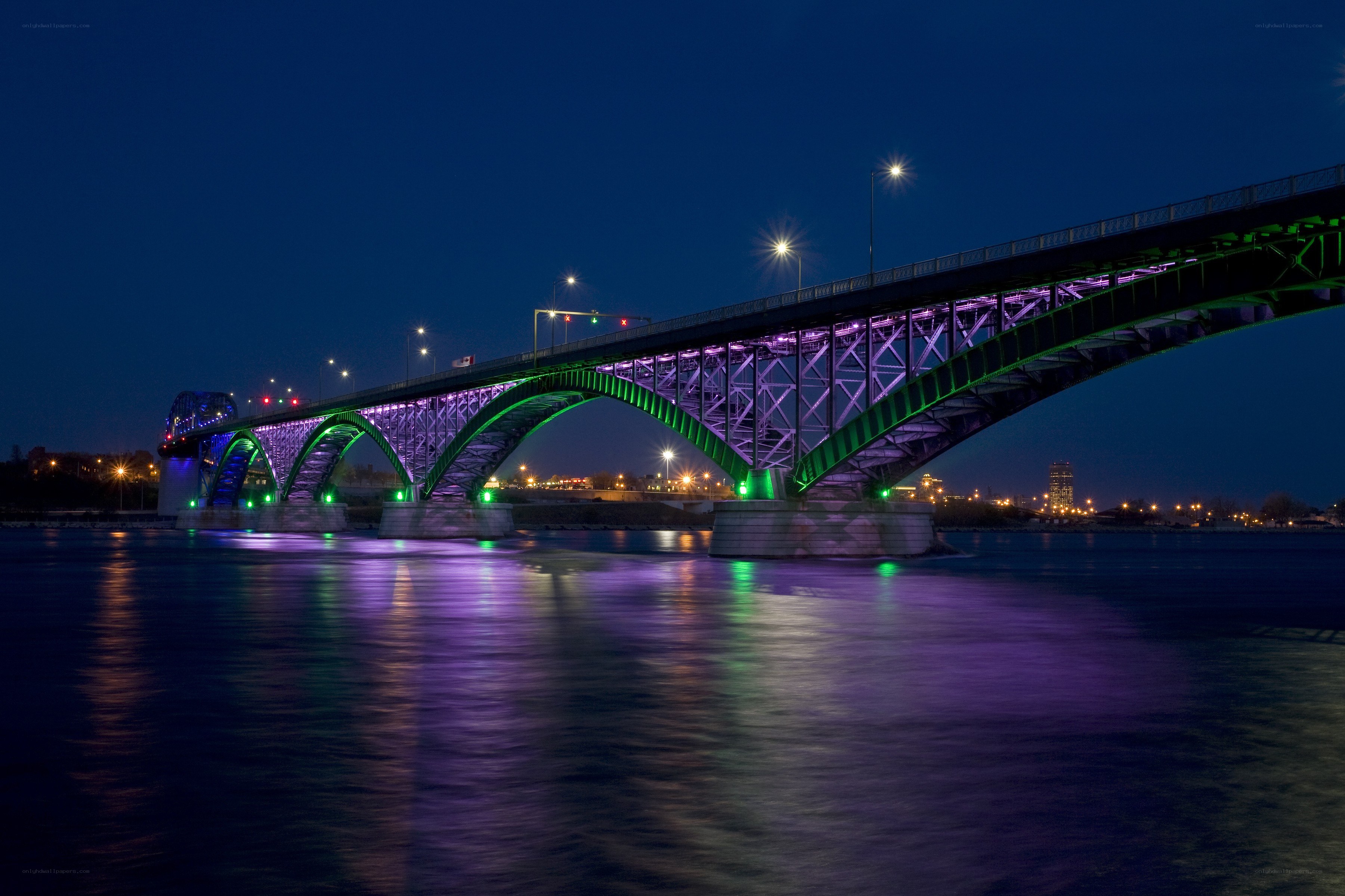 illuminated bridge at night