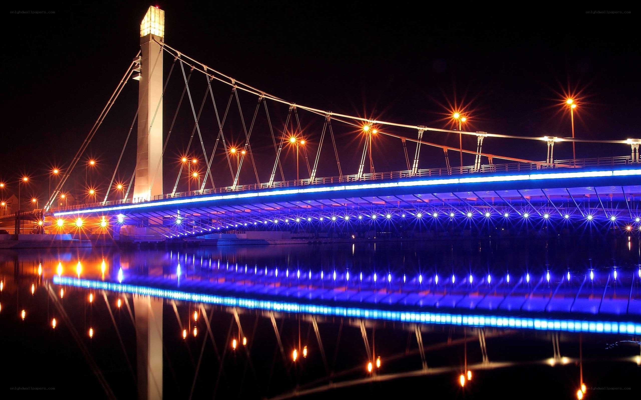 illuminated bridge at night
