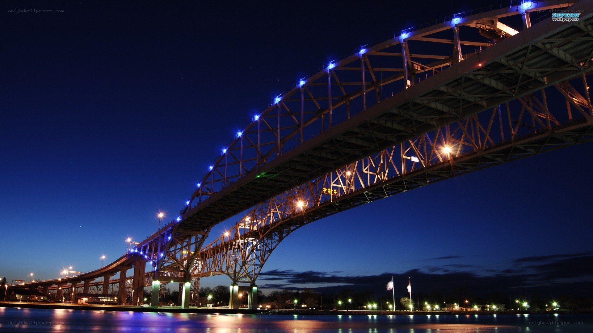 illuminated bridge at night