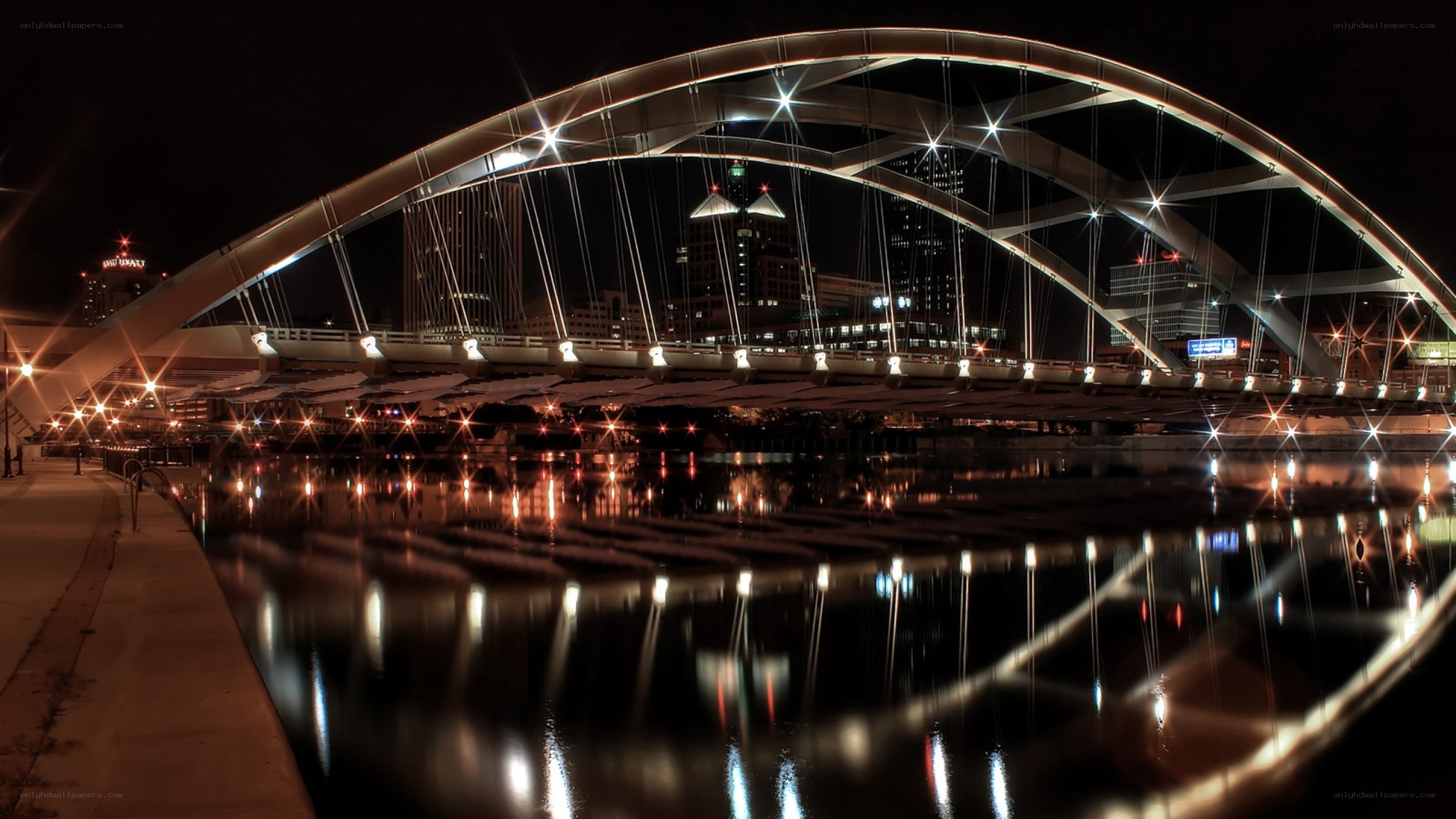 illuminated bridge at night