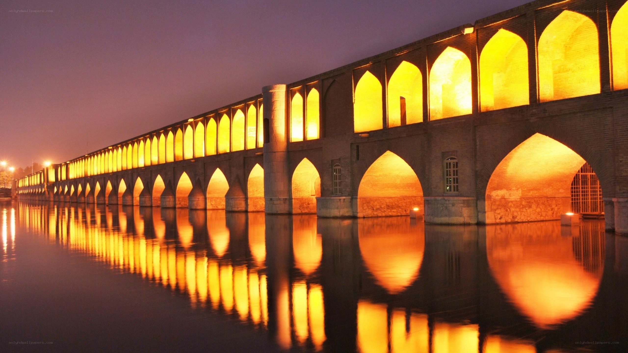illuminated bridge at night