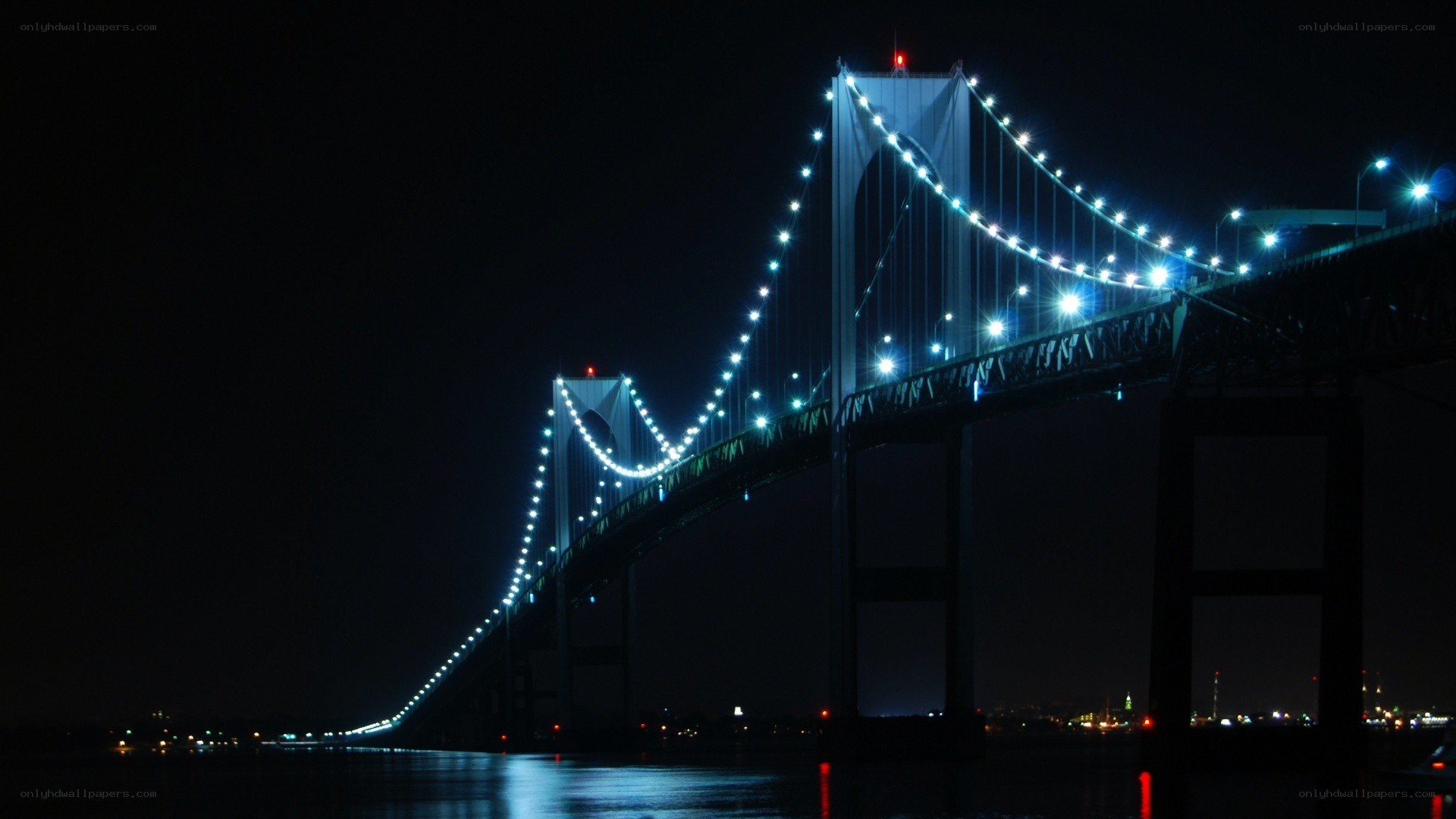 illuminated bridge at night