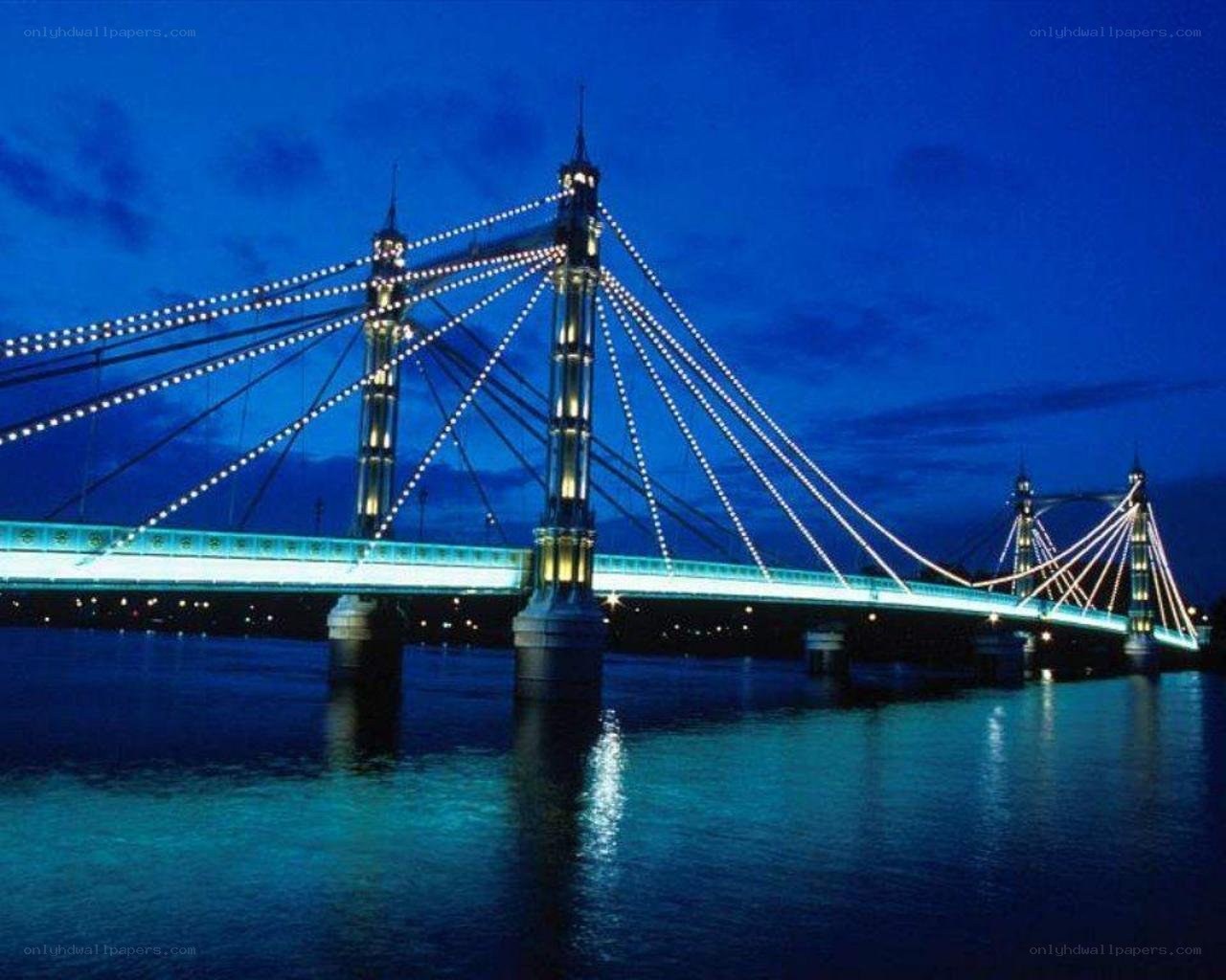 illuminated bridge at night
