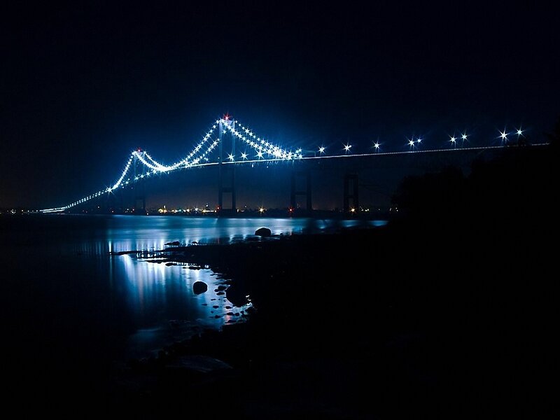 illuminated bridge at night