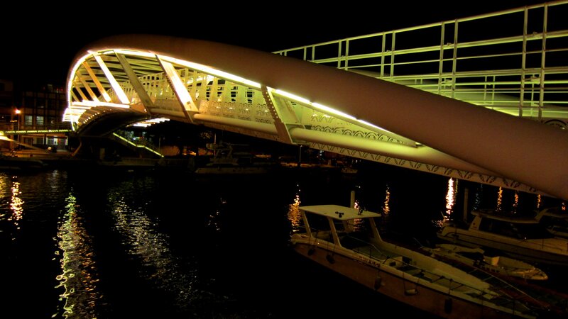 Illuminated Bridge at Night — Black, Dramatic, Photograph, Boat