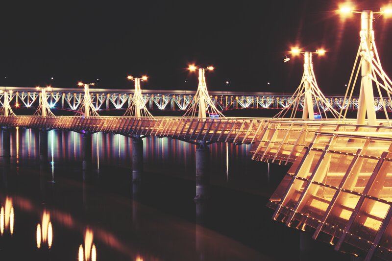 Illuminated Bridge at Night — Black, Dramatic, Photograph, River, Lights