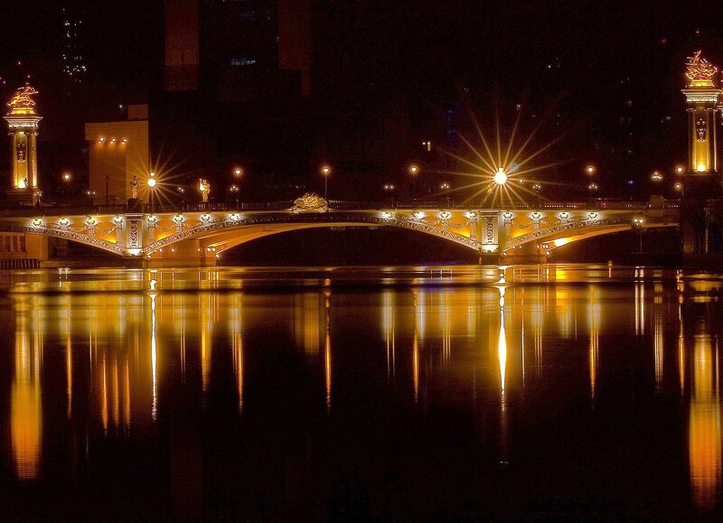 Illuminated Bridge at Night — Black, Serene, Photograph, River