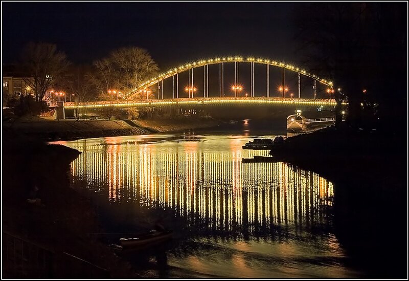 Illuminated Bridge at Night — Black, Serene, Photograph