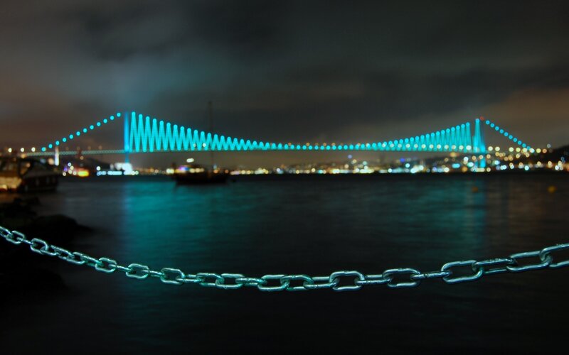 Illuminated Bridge at Night — Blue, Calm, Photograph, Chain