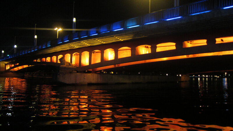 Illuminated Bridge at Night — Blue, Dramatic, Photograph, Water, Lights