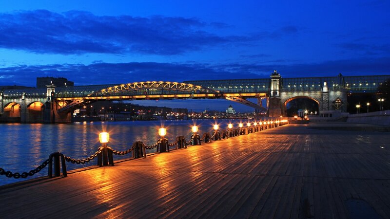 Illuminated Bridge at Night — Blue, Serene, Photograph, River