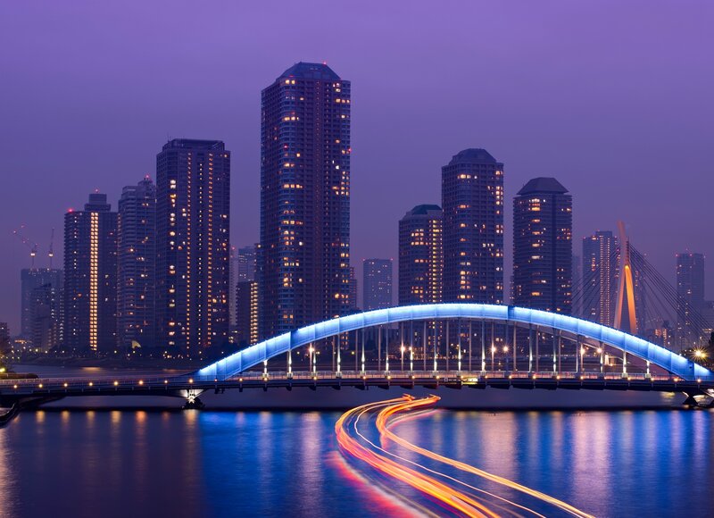 Illuminated Bridge at Night — Blue, Serene, Photograph, Skyscraper, River