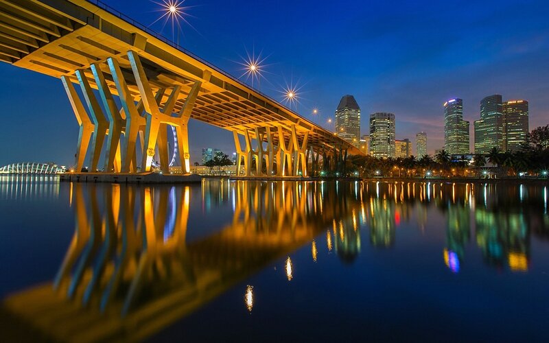 Illuminated Bridge at Night — Blue, Serene, Photograph, Skyscraper
