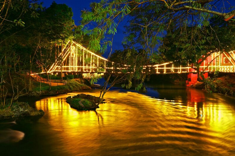 Illuminated Bridge at Night — Yellow, Serene, Photograph
