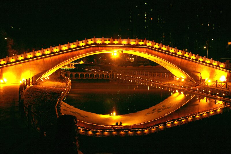 Illuminated Bridge at Night — Yellow, Serene