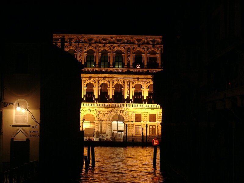 Illuminated Building at Night — Black, Dramatic, Photograph, Canal