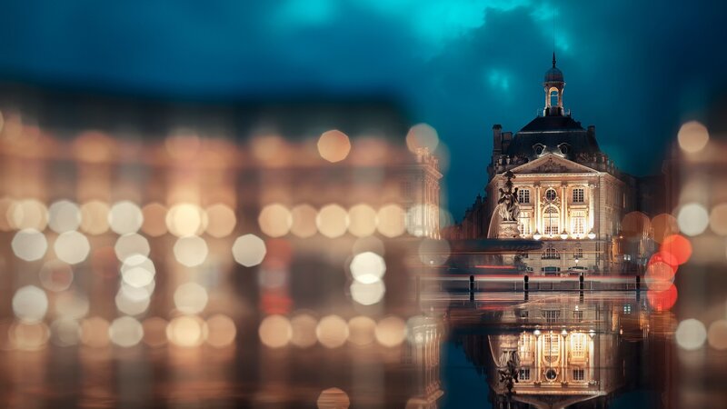 Illuminated Building at Night — Blue, Dramatic, Photograph, Statue