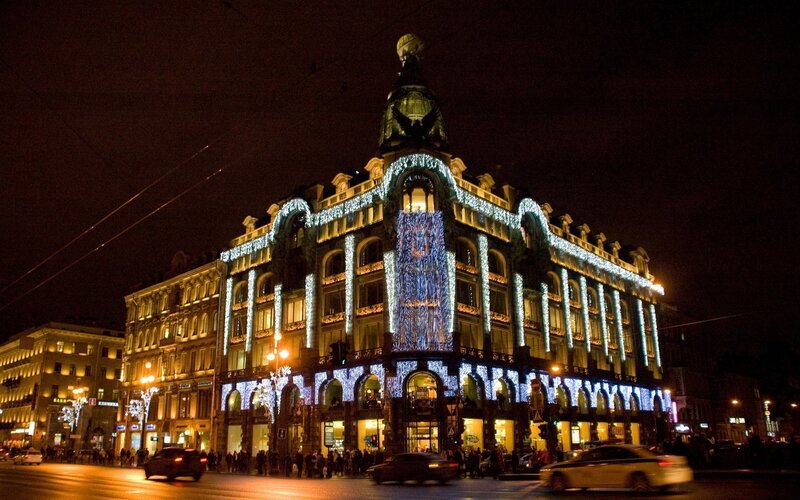 Illuminated Building at Night — Blue, Festive, Photograph, Cars, People