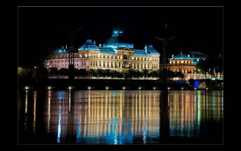 Illuminated Building at Night — Blue, Serene, Photograph, River