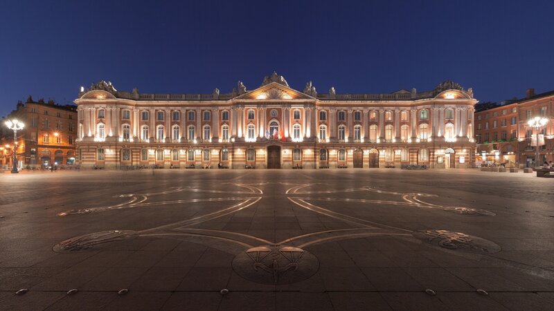 Illuminated Building at Night — Blue, Serene, Photograph, Square, Streetlights