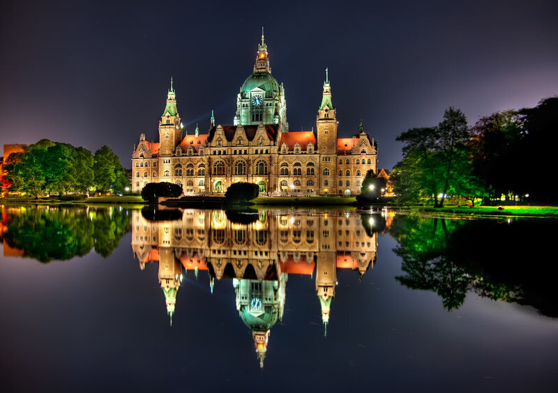 Illuminated Building at Night — Blue, Serene, Photograph