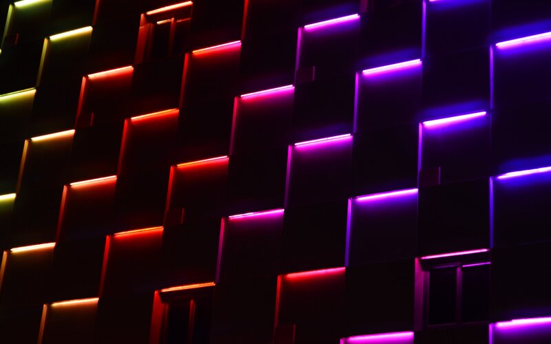 Illuminated Building Facade — Purple