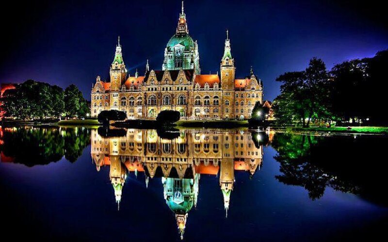 Illuminated Building Reflection — Blue