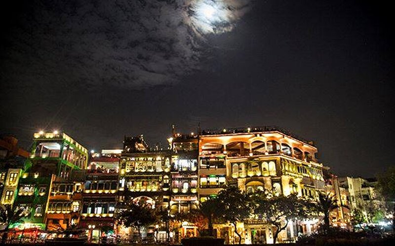 Illuminated Buildings at Night — Black