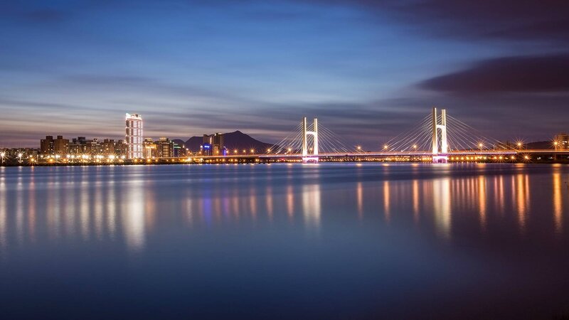 Illuminated Cable-stayed Bridge — Blue, Serene, Night, Photograph, City Skyline