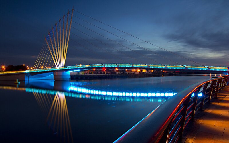 Illuminated Cable-stayed Bridge — Blue, Serene, Night, Photograph, River, Walkway
