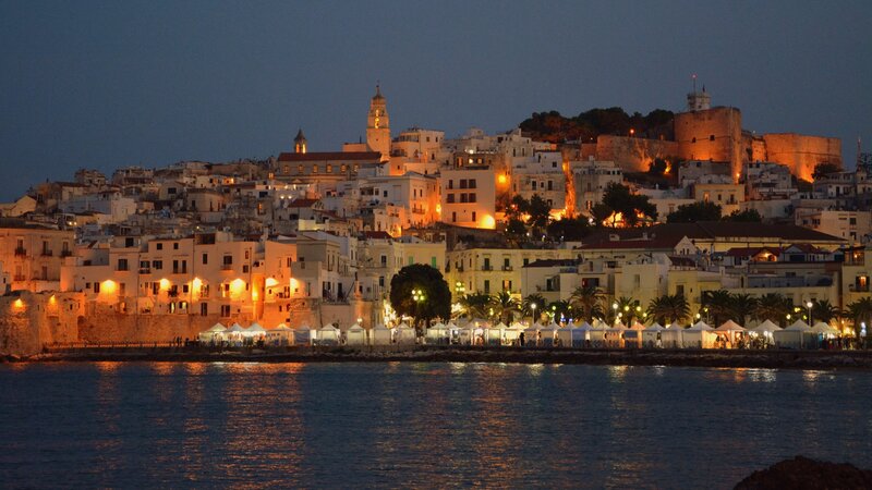 Illuminated Coastal Town — Blue, Serene, Night, Photograph, Buildings