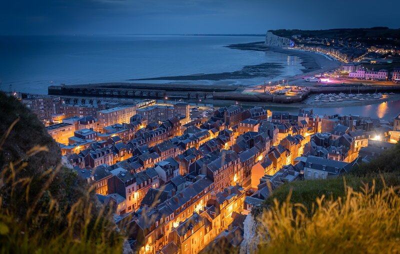 Illuminated Coastal Town — Blue, Serene, Night, Photograph, Sea