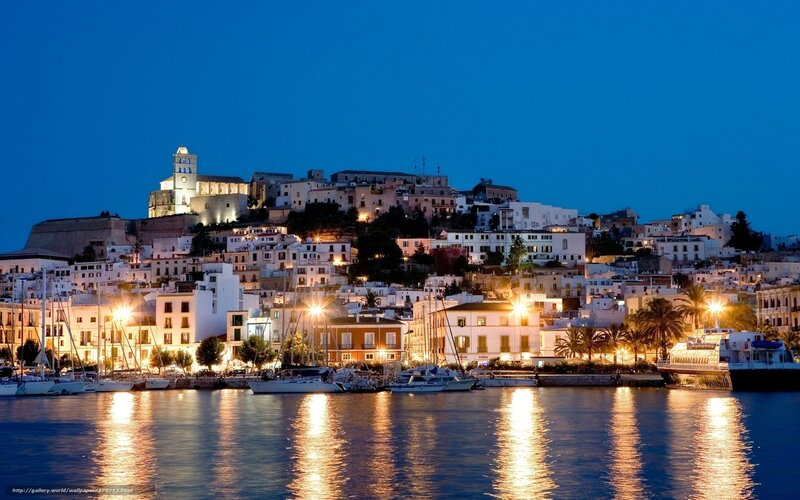 Illuminated Coastal Town — Blue, Serene, Night