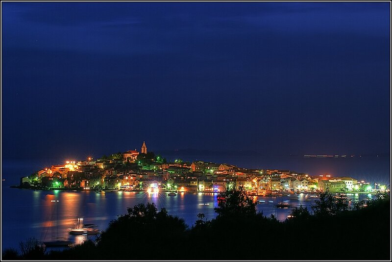 Illuminated Coastal Town — Blue