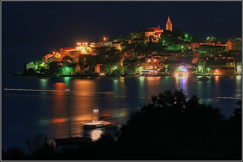 Illuminated Coastal Town