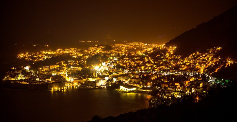 Illuminated Coastal Town — Yellow