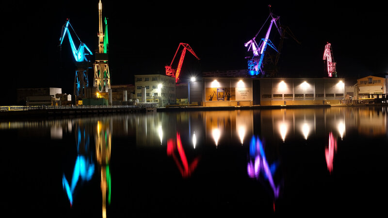 Illuminated Cranes at Night
