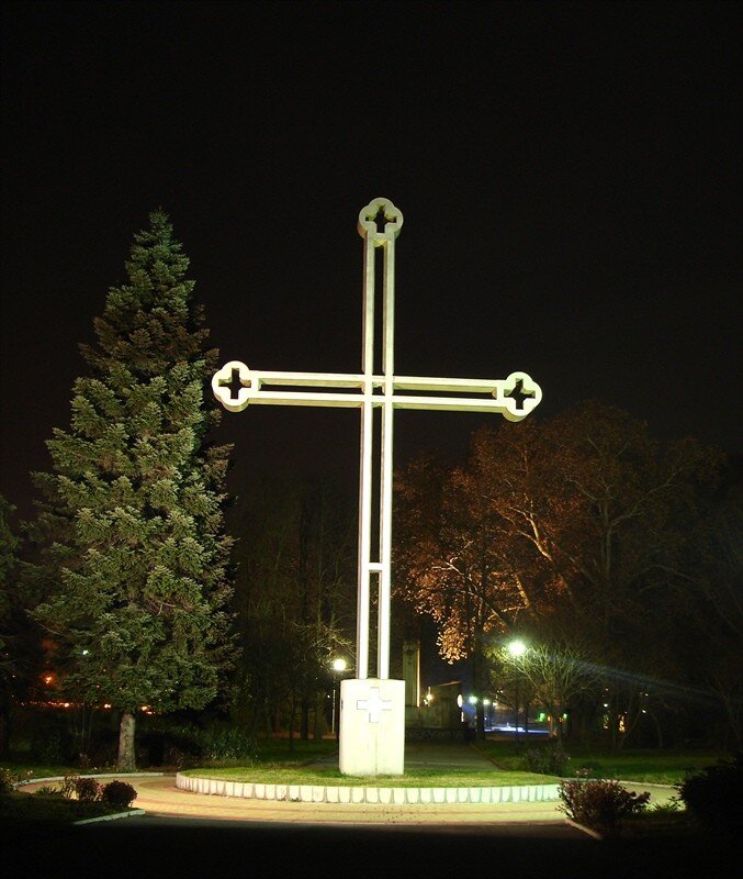 illuminated cross at night