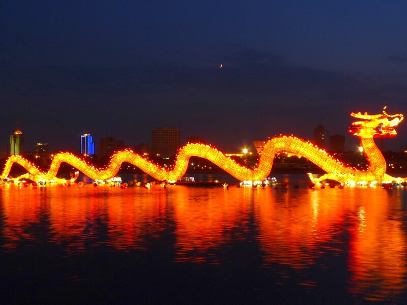 Illuminated dragon on water